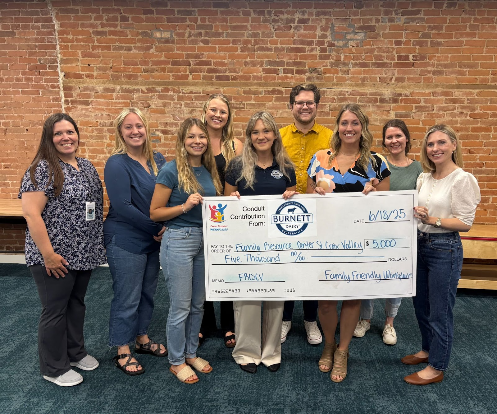 Burnett Dairy and Family Friendly Workplaces Donate to Family Resource Center